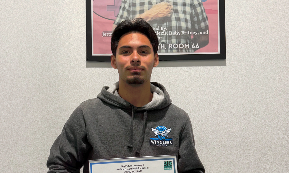 Jesus Fabian, a graduate of Latitude High School, displays the certificate he earned in his aviation internship senior year. (Latitude)